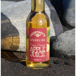 A 330ml bottle Courtney's sparkling apple juice pressed in Devon